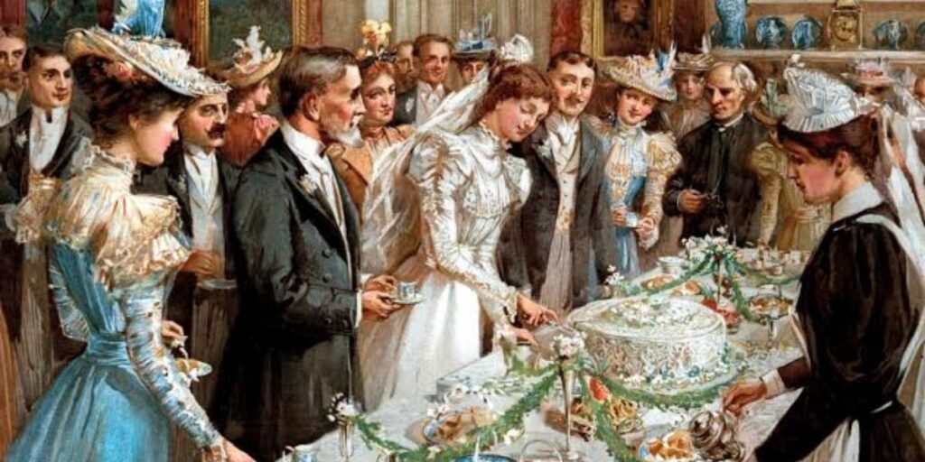 Evolucao-dos-bolos-de-casamento-Imagem_-Uma-Festa-de-Casamento-Vitoriana-_-Artista-Thomas-Benjamin-Kennington-Ingles-1856–1916-1024x512 Evolucao-dos-bolos-de-casamento-Imagem_-Uma-Festa-de-Casamento-Vitoriana-_-Artista-Thomas-Benjamin-Kennington-Ingles-1856–1916-1024x512